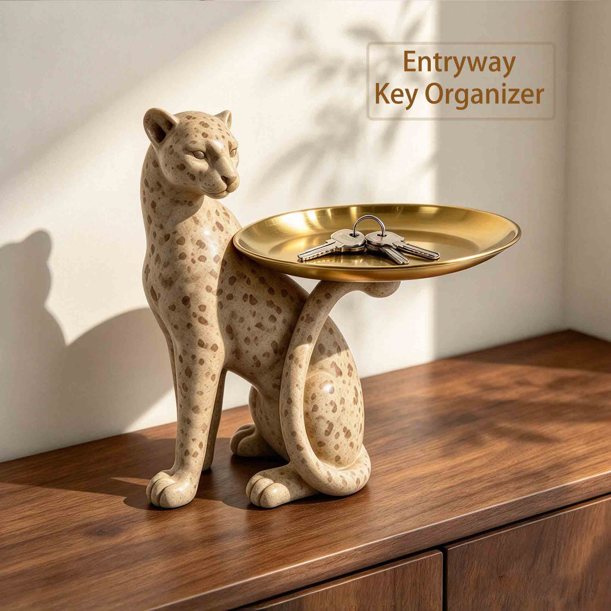 Leopard tray figurine used as a key organizer on an entryway table
